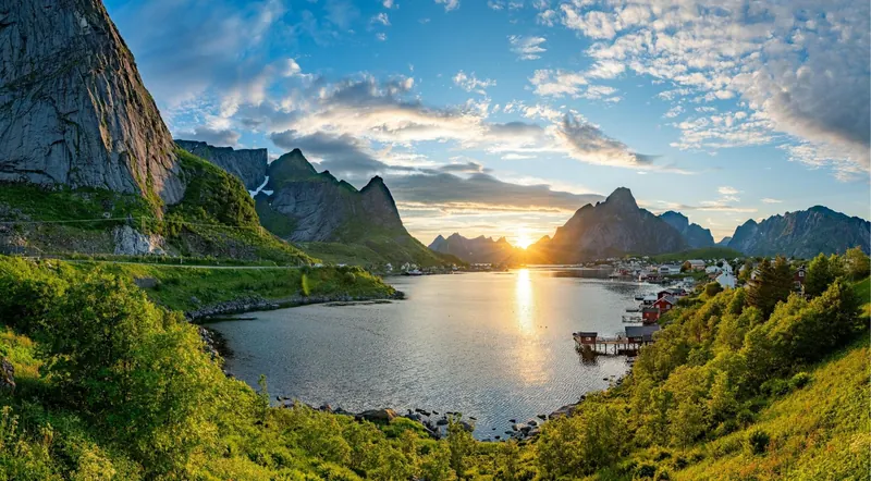 A western Norway fjord glowing gold at sunset